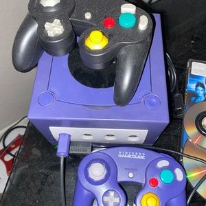 nintendo gamecube with two controllers